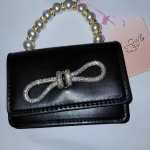 Black Clutch with Pearl Handle